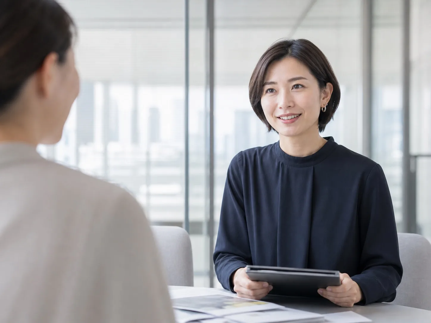 A CREARC communications representative speaking with a visitor